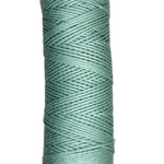 Skein of Coastal Cotton Yarn in the color icy green 