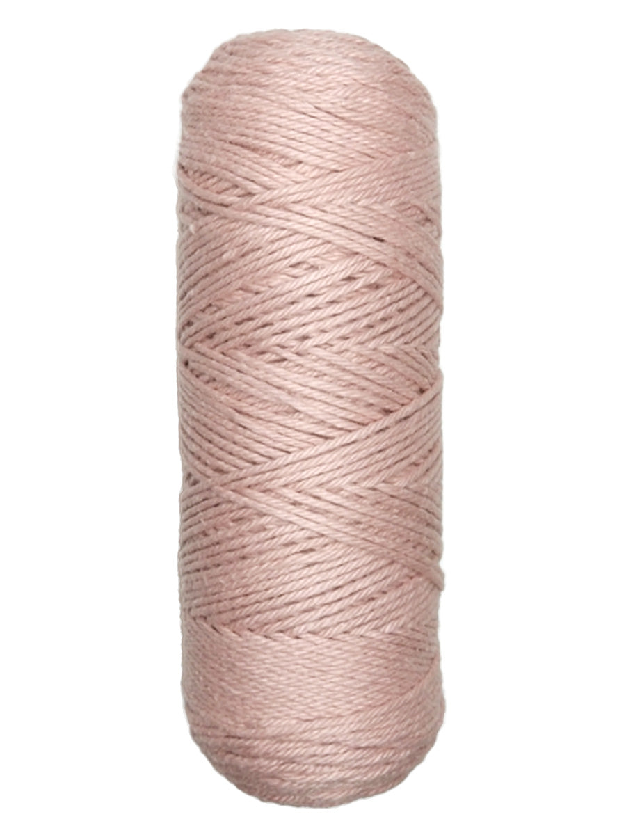 A photo of a skein of dusty pink Coastal Cotton Cotton Yarn