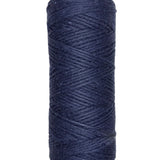 A photo of a skein of dark navy blue Coastal Cotton Cotton Yarn