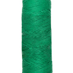 A photo of a skein of green Coastal Cotton Cotton Yarn
