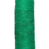A photo of a skein of green Coastal Cotton Cotton Yarn