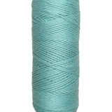A photo of a skein of moonstone Coastal Cotton Cotton Yarn