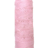 A photo of a skein of rose quartz Coastal Cotton Cotton Yarn