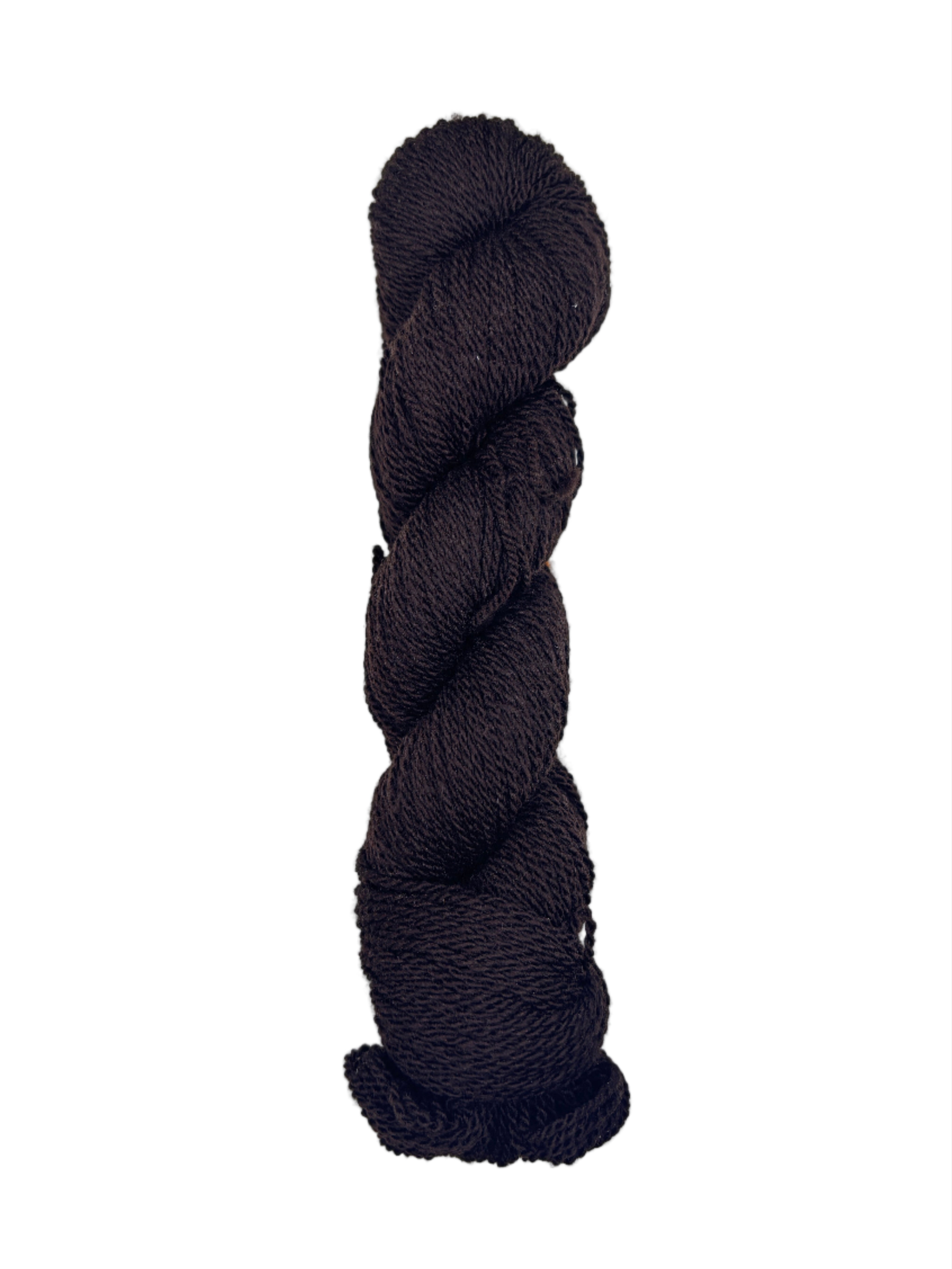 Dark Brown/Black skein of mountain meadow wool yarn on a white background