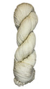 A skein of natural cream colored wool yarn 