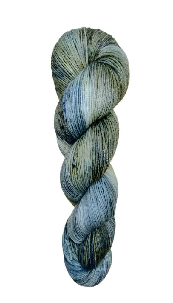A skein of hand-dyed fingering/sock yarn color grey blue black speckles