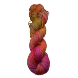 Multicolored skein of yarn on a white background