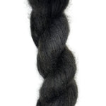Skein of hand dyed mohair silk in the color black