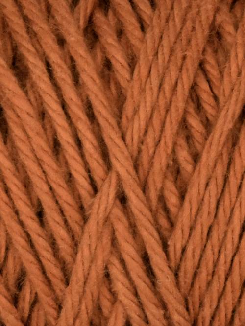 Sandstone colored skein of cotton yarn