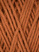 Sandstone colored skein of cotton yarn