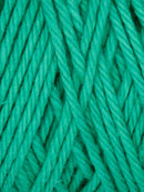 Turquoise colored skein of yarn 