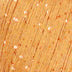 Close-up of a light orange/apricot colored Paillettes yarn