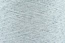 Close-up of Silver White, a white base yarn with silver sparkles
