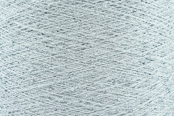 Close-up of Silver White, a white base yarn with silver sparkles