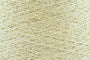Close-up of Gold White, a white base yarn with gold sparkles