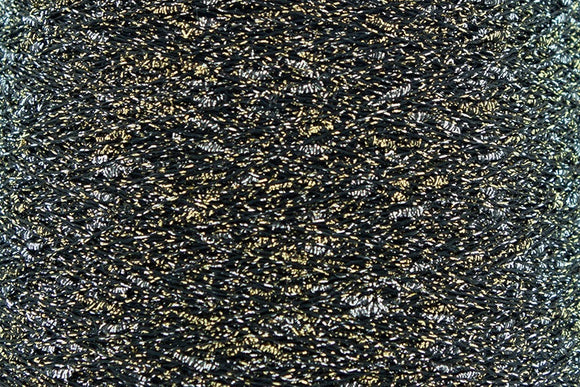 Close-up of Silver-Gold Black, a black base yarn with silver and gold sparkles