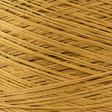 Close-up of Mustard, a muted yellow yarn