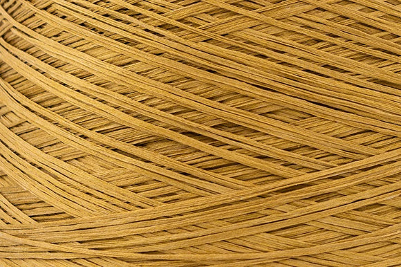 Close-up of Mustard, a muted yellow yarn