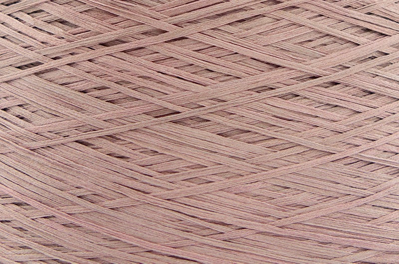 Close-up of Logwood, a light pink-tan yarn