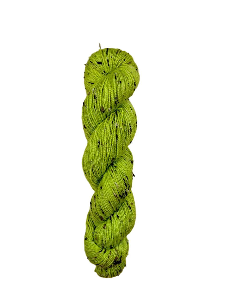 Green skein of yarn on a wooden surface