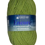 Ball of grass green wool yarn 