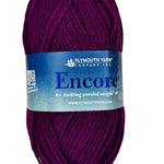 Berry purple red skein of yarn