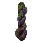 Multicolored skein of yarn on a white background