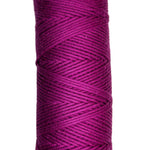 Skein of Coastal Cotton Yarn in the color magenta