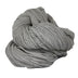 Light grey skein of fingering weight wool yarn 
