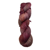Multicolored skein of yarn on a white background