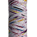 Black, red, yellow, blue speckled skein of yarn 
