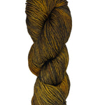 A brown and black variegated skein of yarn
