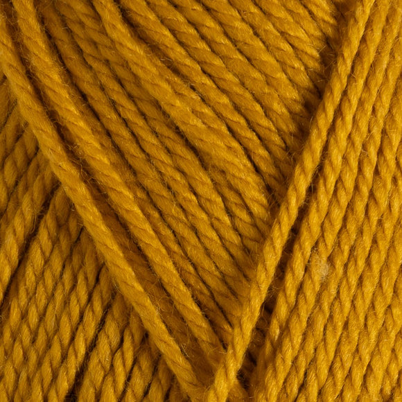 Close-up of a ball of mustard yellow yarn