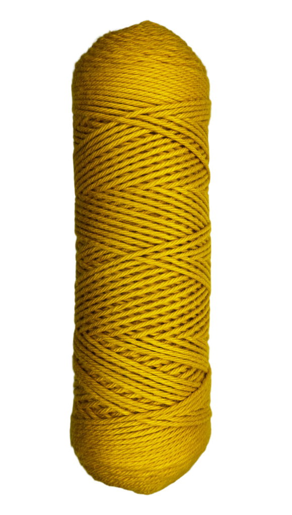 Golden yellow skein of cotton yarn