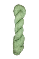 A skein of Mountain Meadow Wool Yarn in the color light green