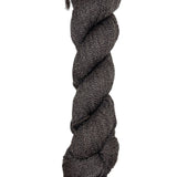 A skein of Mountain Meadow Wool Yarn in the color dark brown