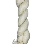 A skein of Mountain Meadow Wool Yarn in the color natural