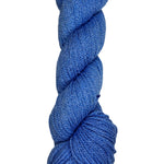 A skein of Mountain Meadow Wool Yarn in the color sky blue