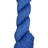 A skein of Mountain Meadow Wool Yarn in the color sky blue