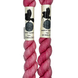 Mini Skeins of Hand Dyed yarn in the color bubblegum pink