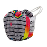 A handmade face mask cover made from a gray striped heather fabric, decorated with a rainbow heart, a pink heart, and a bright rainbow-striped elastic band, shown on a white background.