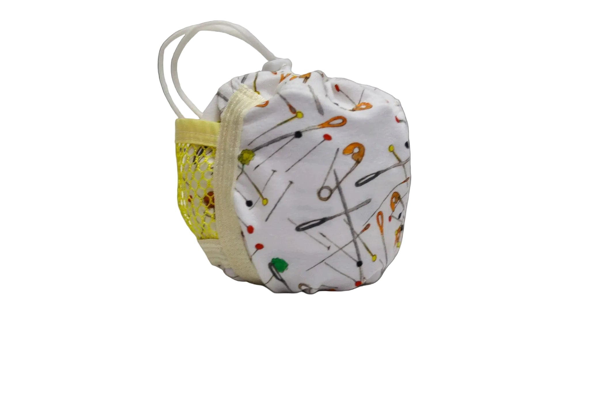 A small fabric pouch with a white background and a print of safety pins in various colors. It features a yellow mesh side pocket with a white zipper and a white elastic loop strap.
