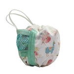 A small fabric drawstring pouch with a white background, a colorful alpaca and floral print, a mint green zipper, and a teal mesh pocket on the side, shown on a plain light gray background.