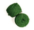 Two balls of dark green yarn on a plain white background, one wound into a cone and one into a flat spiral.