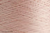 Close-up of Pale Blush, a light pink, almost off-white, yarn
