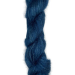 Skein of mohair silk yarn hand-dyed in Wyoming in the color blue