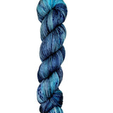Skein of superkid mohair silk lace weight yarn color blue black