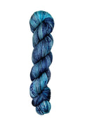 Skein of superkid mohair silk lace weight yarn color blue black