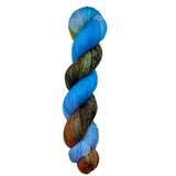 Skein of superkid mohair silk lace weight yarn color blue orange