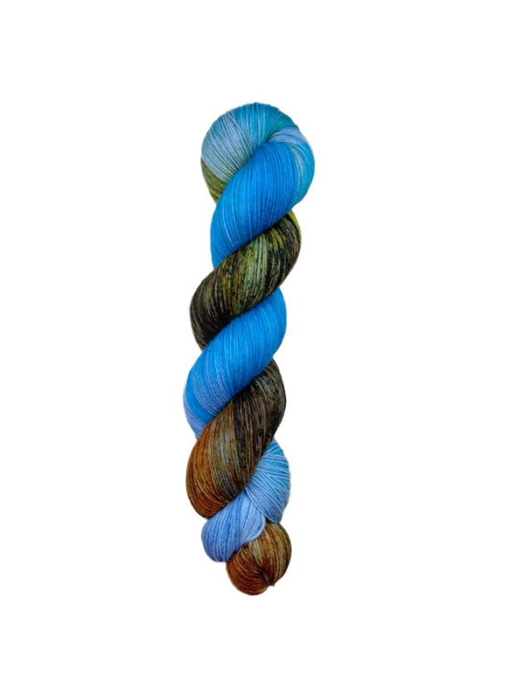 Skein of superkid mohair silk lace weight yarn color blue orange